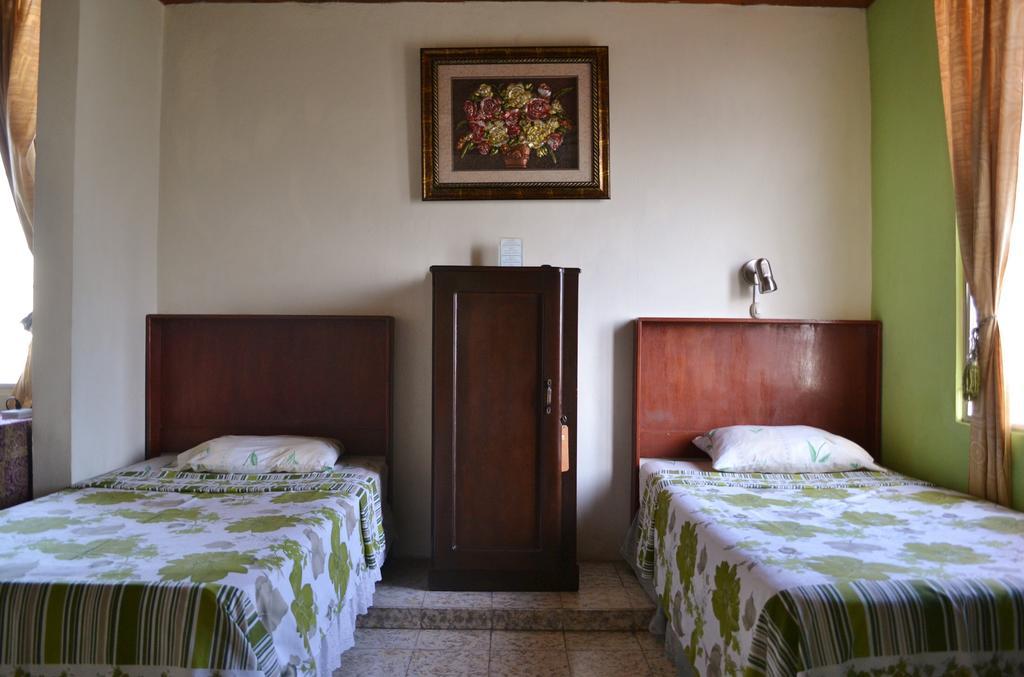 Hotel Oasis San Salvador Oda fotoğraf